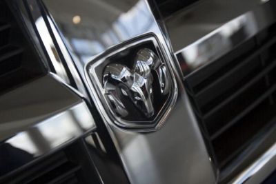 The Dodge emblem on the front of a black pick-up truck. (Photo by: Newscast/UIG via Getty Images)